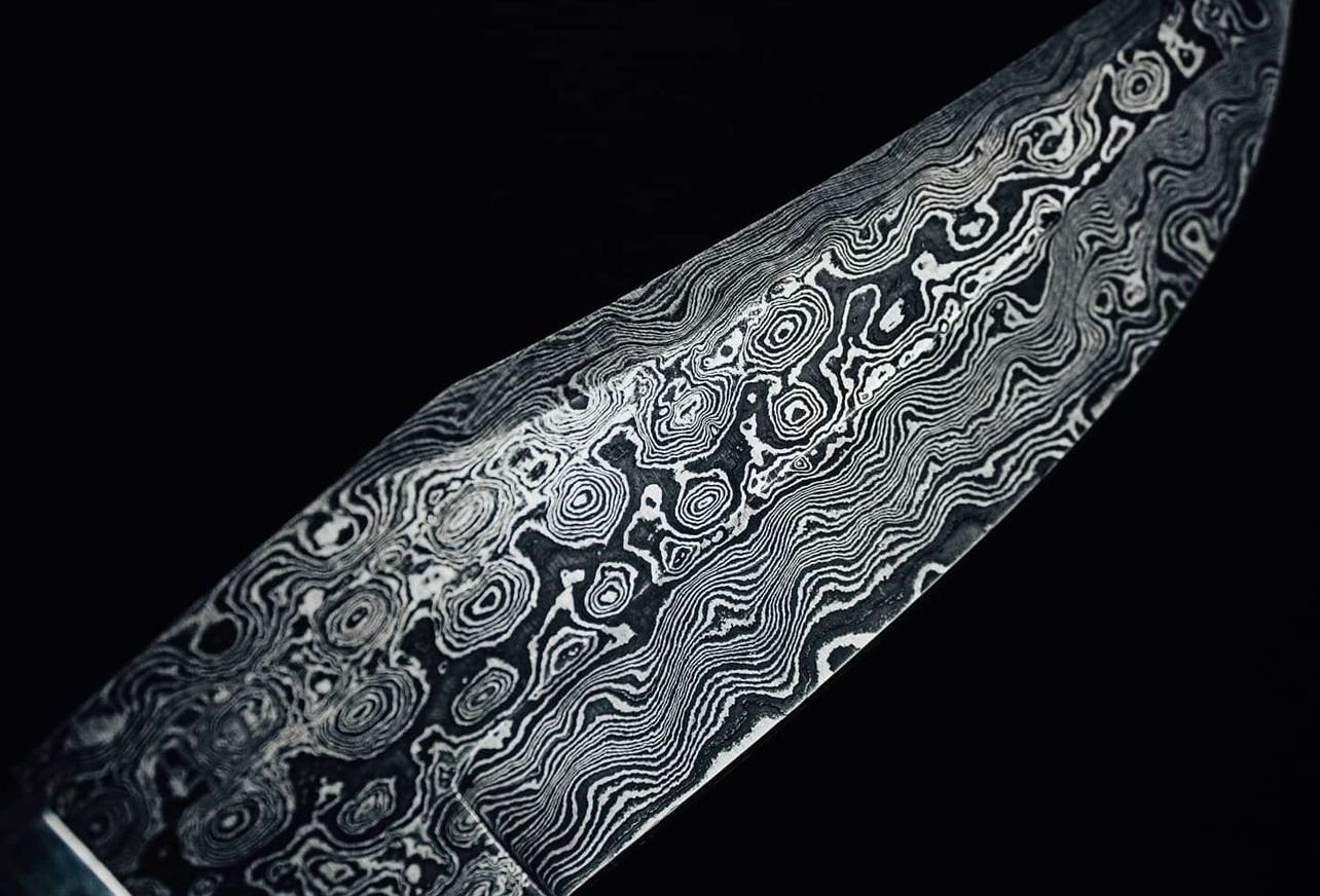 What is damascus steel and how is it made?